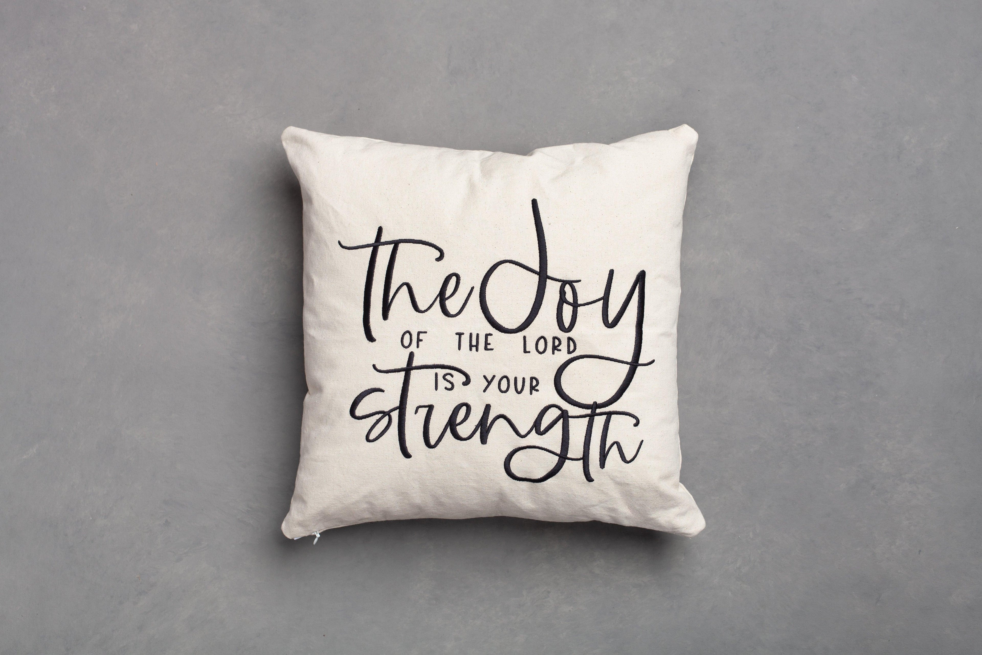 Wheat beige Joy & Strength pillow cover only – soft embroidered Nehemiah 8:10 verse on grey background for encouraging faith-based home styling